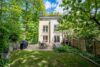 Ein Reihenendhaus, das aus der Reihe tanzt – eine Naturoase in einer der ruhigsten Lagen von Königst - Außenansicht gartenseitig