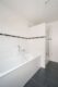 Zwischen Zuhause und Rendite? Attraktives MFH (3 WE) in Toplage Riedberg Quartier "Schöne Aussicht" - Badezimmer 1 (Wohnung OG)
