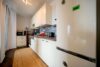 Wohnen mit Weitblick – stilvolle 3-Zimmer-Wohnung mit exklusivem Skylineblick - Küche